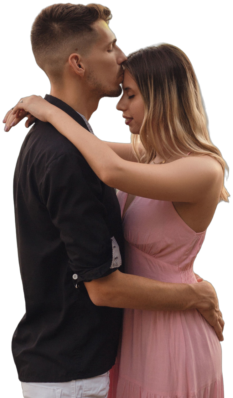 A couple embracing at sunset